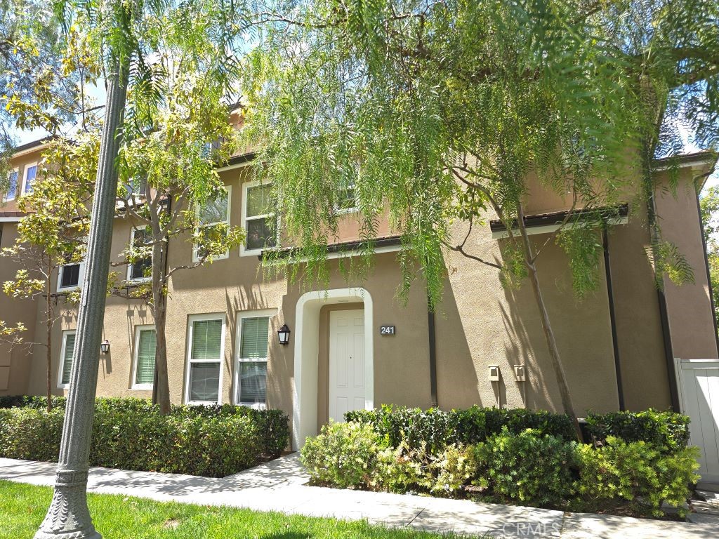 Front door elevation. Park and walk in to your home. Is ideal when you have guest coming. There is tandem 2 car garage i - 241 Lockford, Irvine CA 92602 - photo 1
