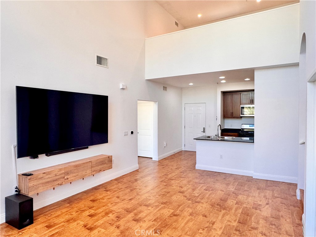 Living Room, Kitchen & Loft - 2423 Scholarship, Irvine CA 92612 - photo 1