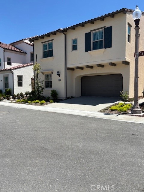 SierraExteriorPhoto - 250 Canterbury, Irvine CA 92618 - photo 1