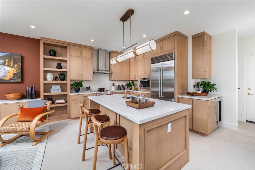 Large kitchen island in our plan 2 model home. - 265 Raffini, Irvine CA 92618 - photo 3