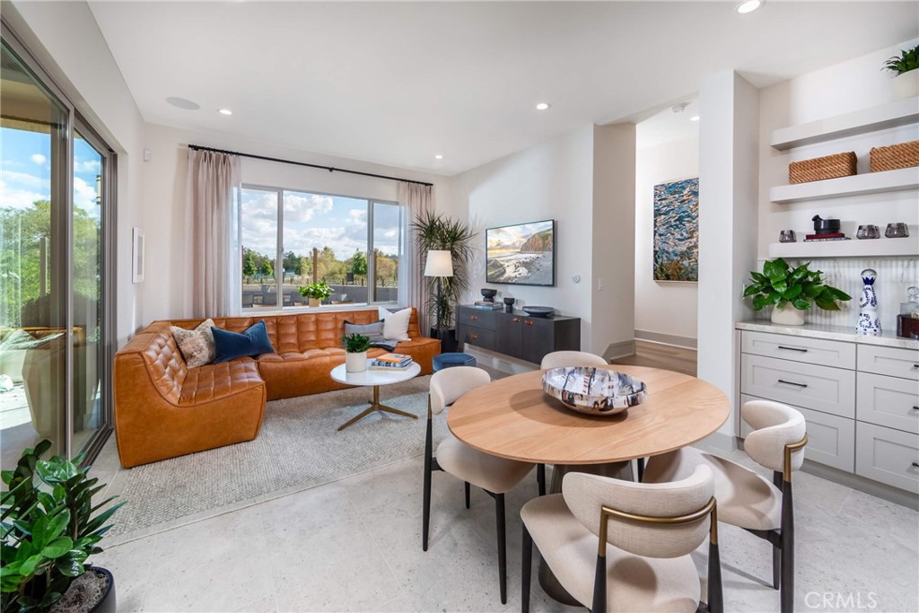 Plan 1 Model home Great room & dining area - 269 Raffini, Irvine CA 92618 - photo 3