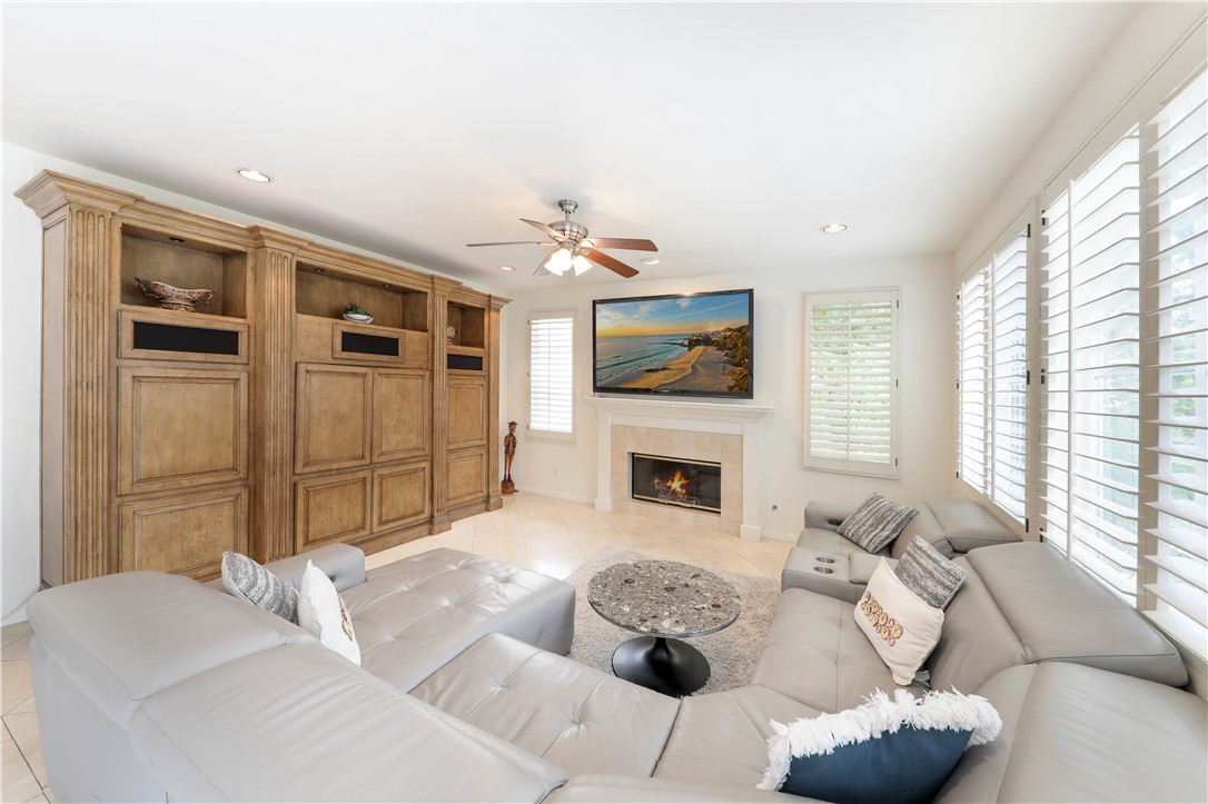 Family room room with fireplace - 27 Vienne, Irvine CA 92606 - photo 8