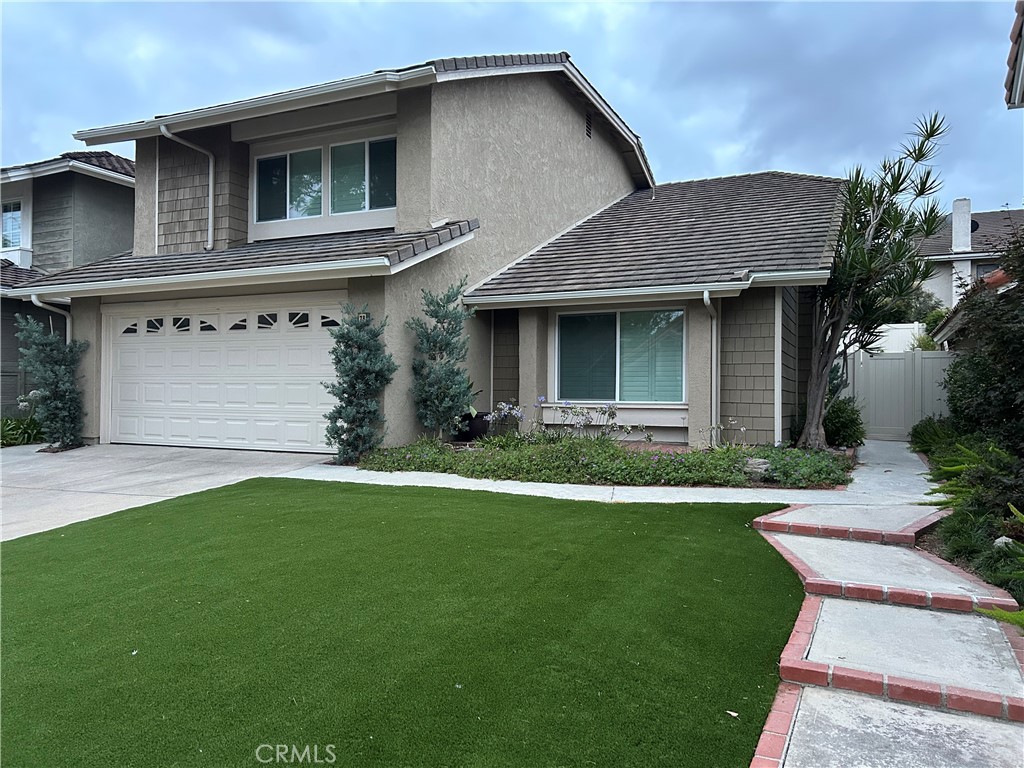 Exterior newly painted with artificial turf - 28 Lucero W, Irvine CA 92620 - photo 2