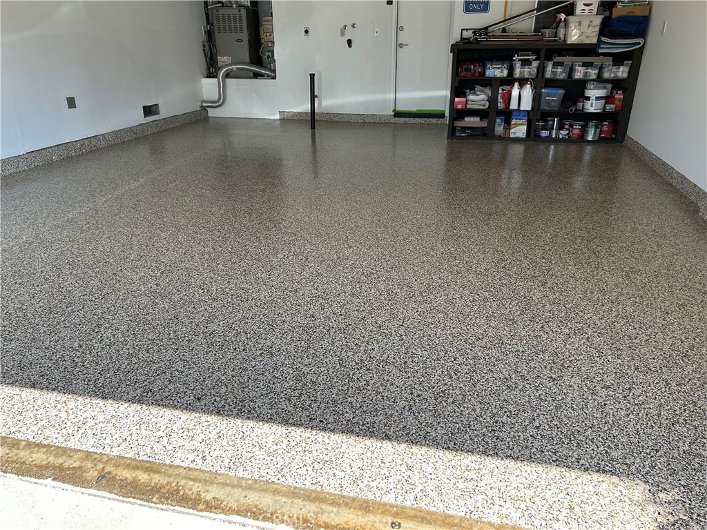 upgraded garage epoxy flooring - 28 Lucero W, Irvine CA 92620 - photo 21