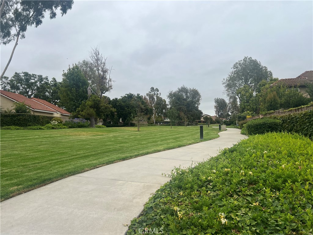 Steps to walking trail to community pool . - 28 Lucero W, Irvine CA 92620 - photo 24