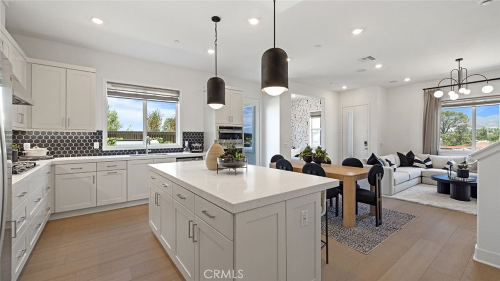 Photos shown are of model only- not actual homesite. - 295 Shoveler, Irvine CA 92618 - photo 1