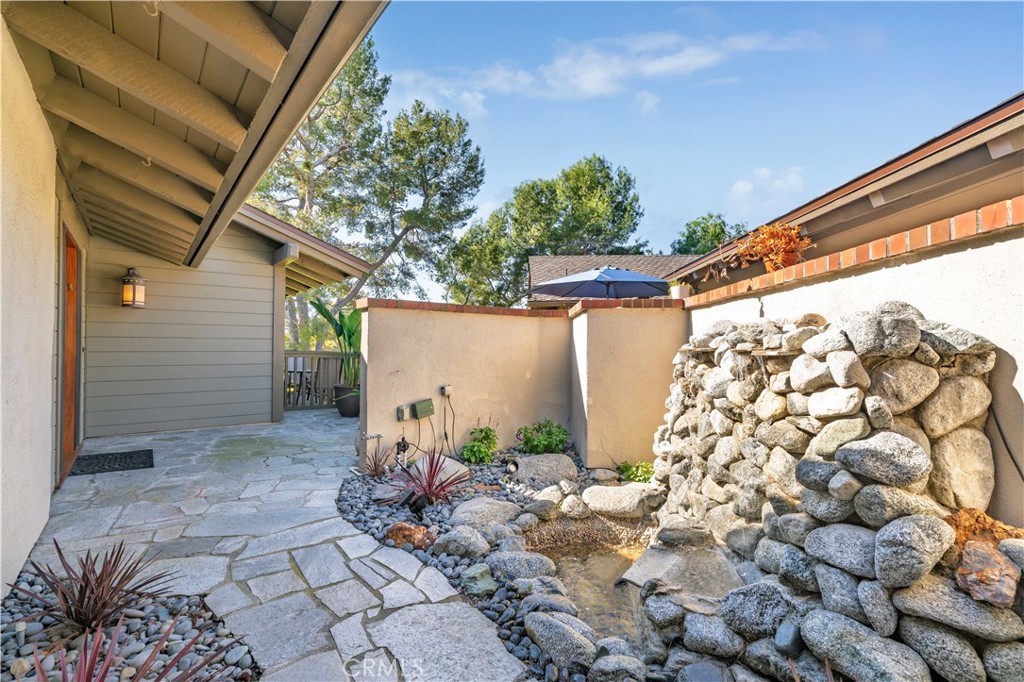 Front Courtyard with fountain & rock waterfall - 30 Arboles 34, Irvine CA 92612 - photo 4