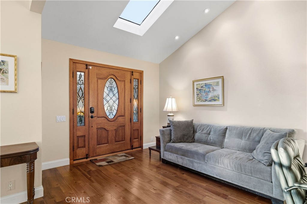 Open room with skylight inside front door - 30 Arboles 34, Irvine CA 92612 - photo 10