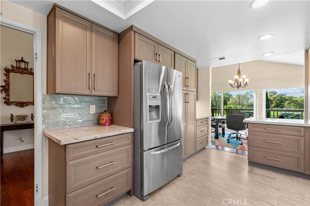 Kitchen open to Dining Room - 30 Arboles 34, Irvine CA 92612 - photo 16