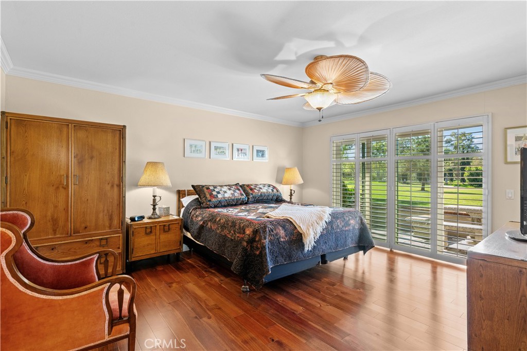 Primary Bedroom with slider to patio and golf view - 30 Arboles 34, Irvine CA 92612 - photo 21