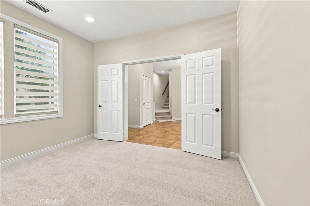 office downstair with french door - 301 Tall Oak, Irvine CA 92603 - photo 7
