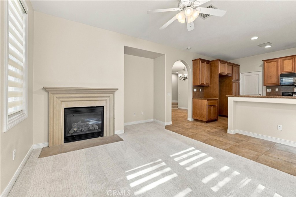 Fireplace inside the family/dining room - 301 Tall Oak, Irvine CA 92603 - photo 13