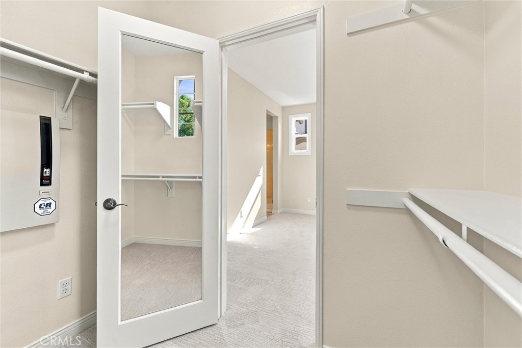Master suite with walk-in closet - 301 Tall Oak, Irvine CA 92603 - photo 27