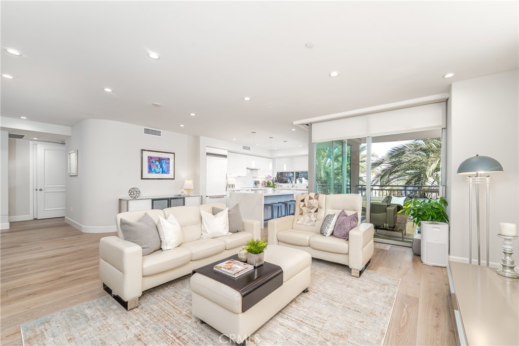 Living room with new wide plank wood floors - 3043 Scholarship, Irvine CA 92612 - photo 17