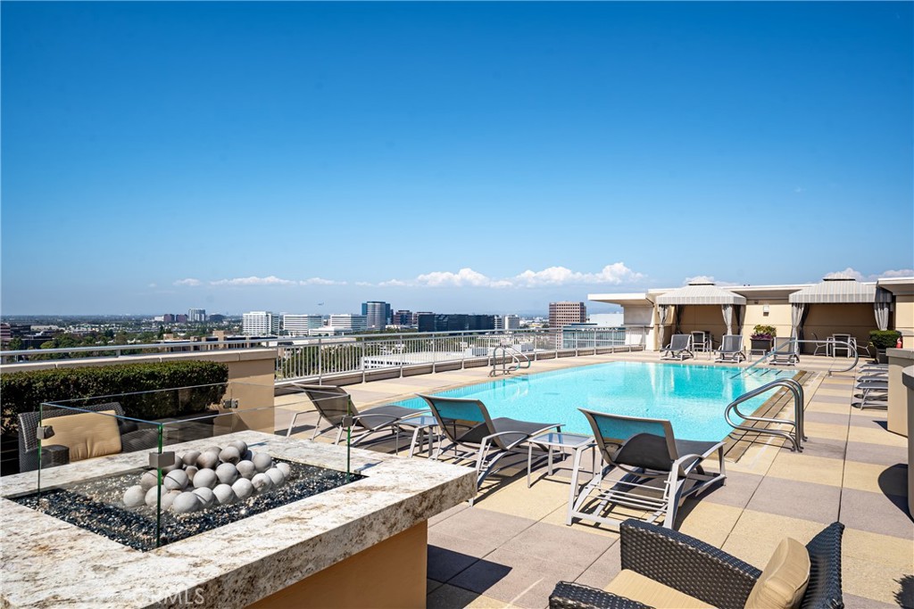 Rooftop pool deck with fire pit, cabanas and lounges - 3043 Scholarship, Irvine CA 92612 - photo 45