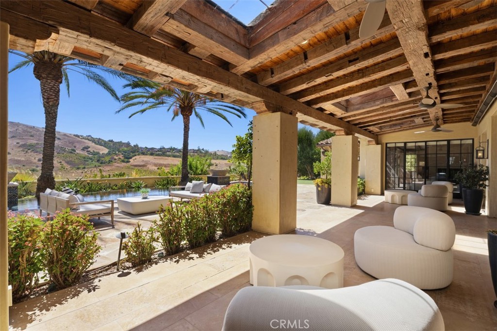Covered loggia with heater floors - 31 Blue Heron, Irvine CA 92603 - photo 11