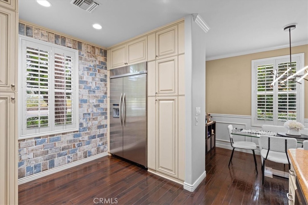 Custom brick wall and built in refrigerator - 3160 Watermarke, Irvine CA 92612 - photo 15