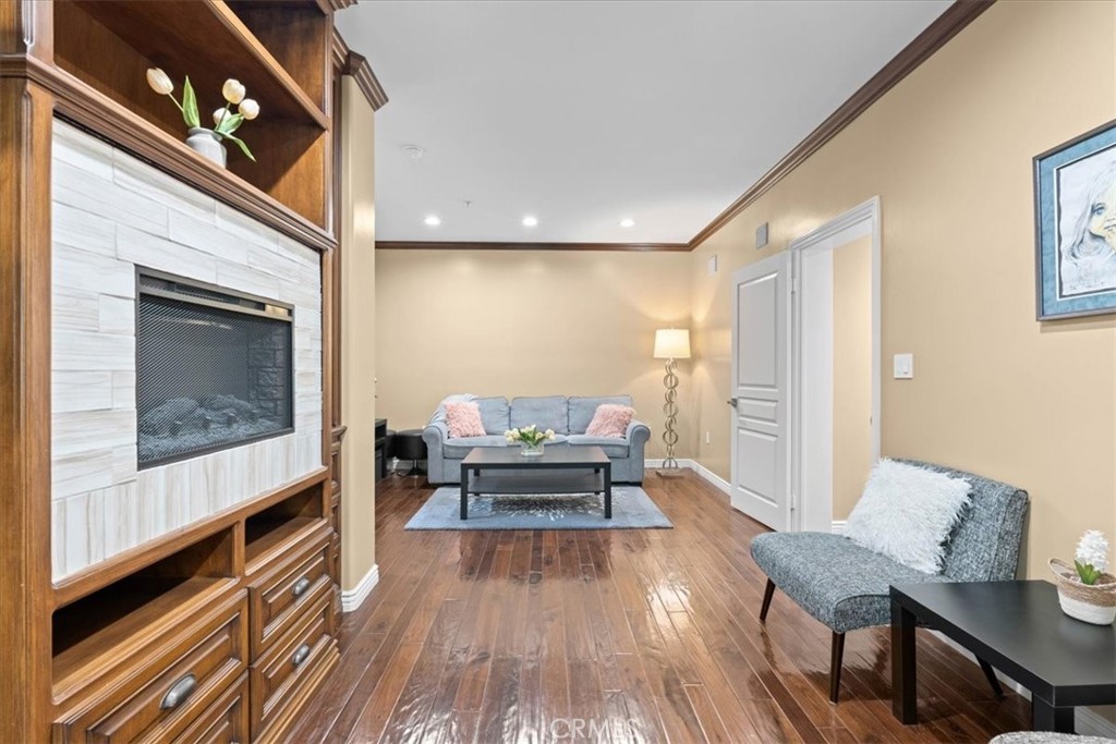 Electric built in fireplace in family room - 3160 Watermarke, Irvine CA 92612 - photo 26