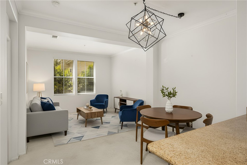 Digitally rendered staging of living area - 3202 Watermarke, Irvine CA 92612 - photo 4