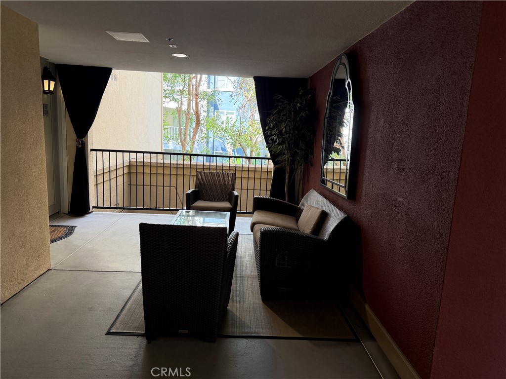 Siting are outside the condo. - 3210 Watermarke, Irvine CA 92612 - photo 4