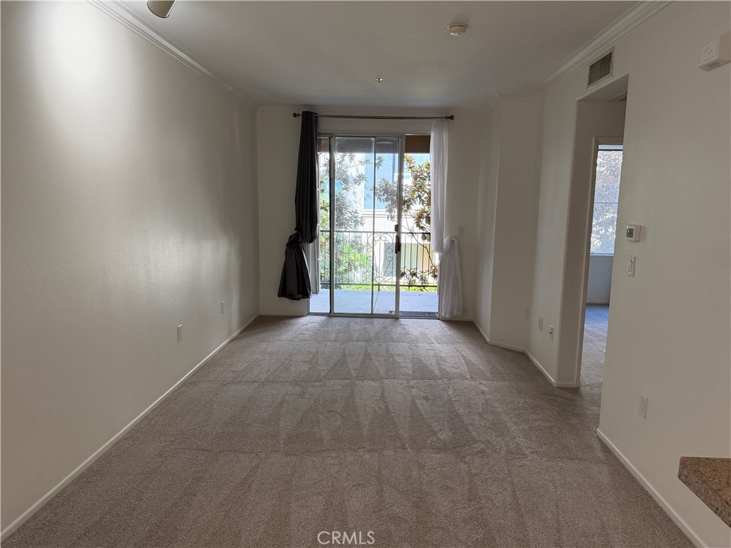 Living and Dining rooms - 3210 Watermarke, Irvine CA 92612 - photo 5