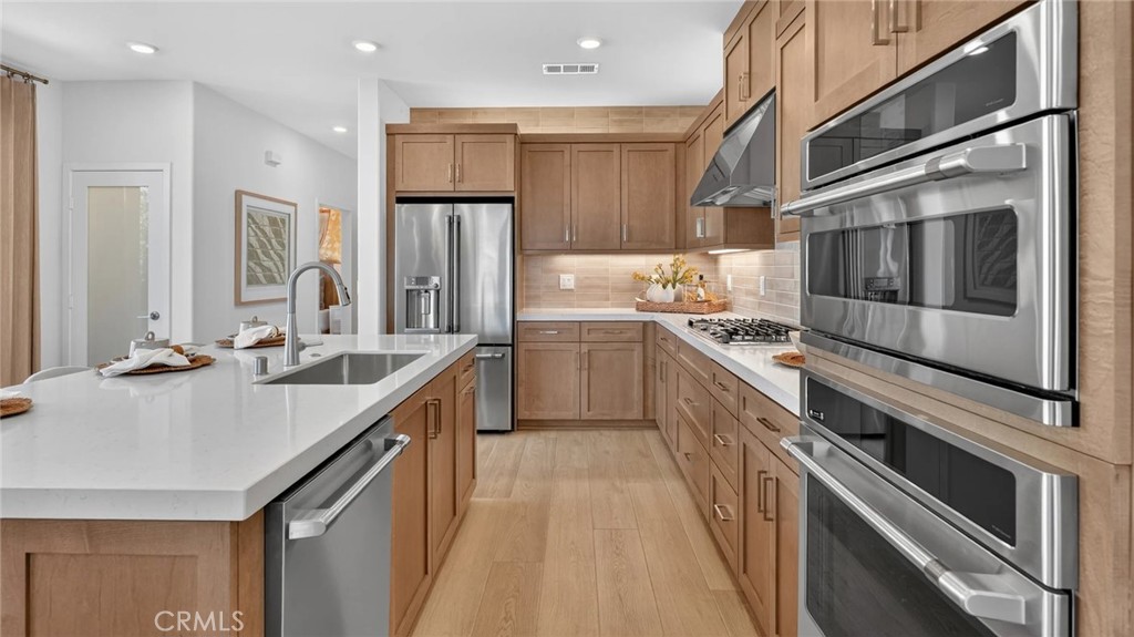 Photos shown are of model only- not actual homesite. - 324 Bracken, Irvine CA 92618 - photo 3