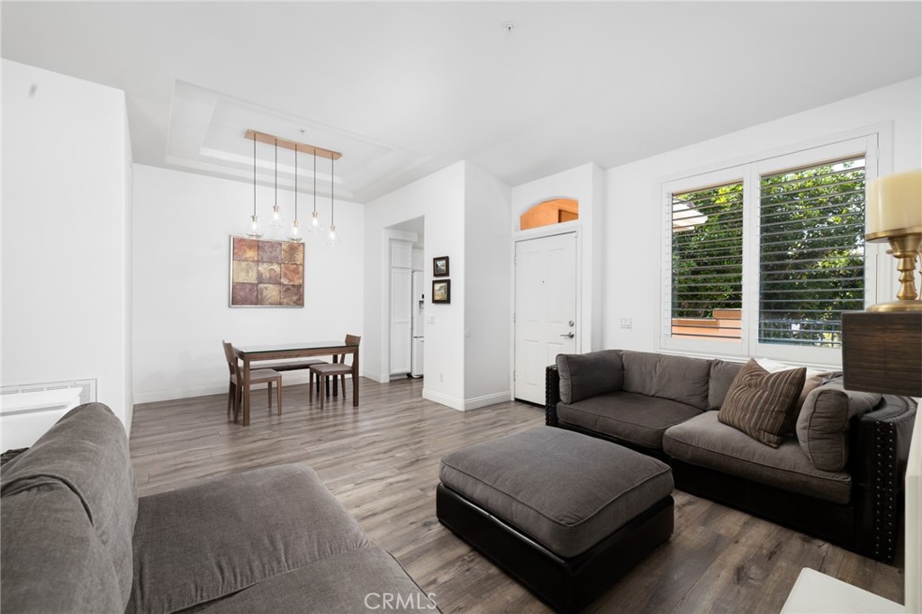 Spacious Main Living Area with Ample Natural Light and Privacy being an End Unit - 3407 Ladrillo Aisle, Irvine CA 92606 - photo 6