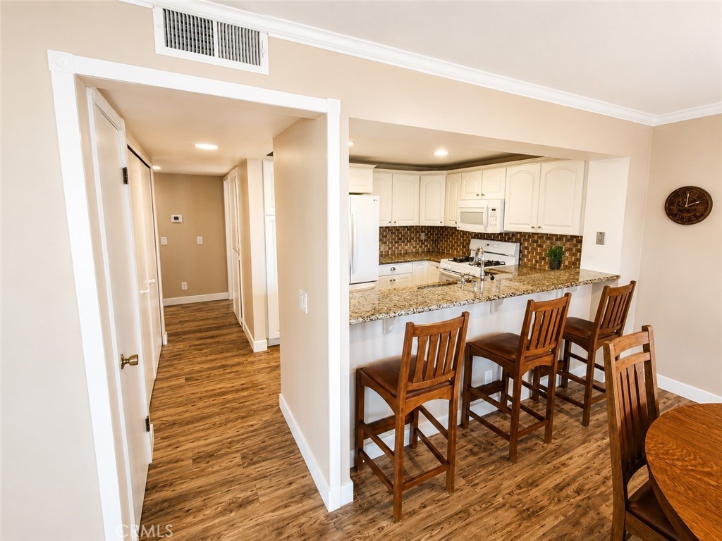 Hallway to Kitchen, Bedrooms and Bath - 36 Woodleaf, Irvine CA 92614 - photo 7