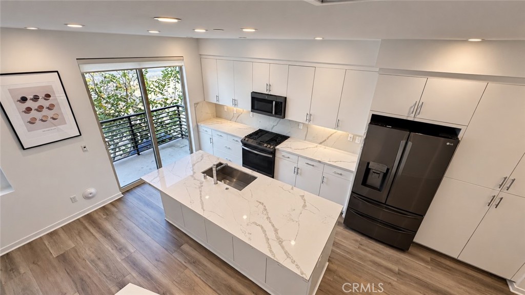 Open kitchen with large island - 369 Placemark, Irvine CA 92614 - photo 14