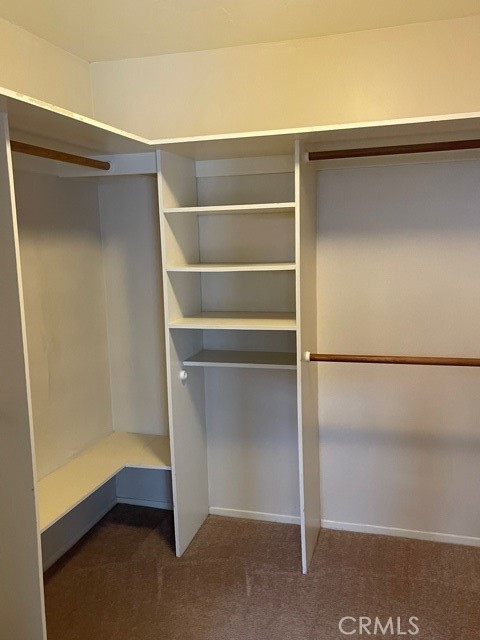Walk-in closet in the master with storage. - 39 Willowgrove, Irvine CA 92604 - photo 12