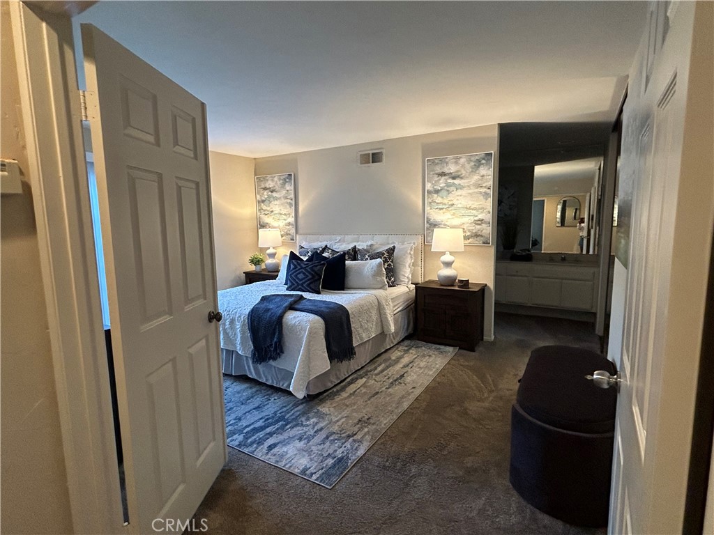 Master bedroom with walk-in closet. - 39 Willowgrove, Irvine CA 92604 - photo 10