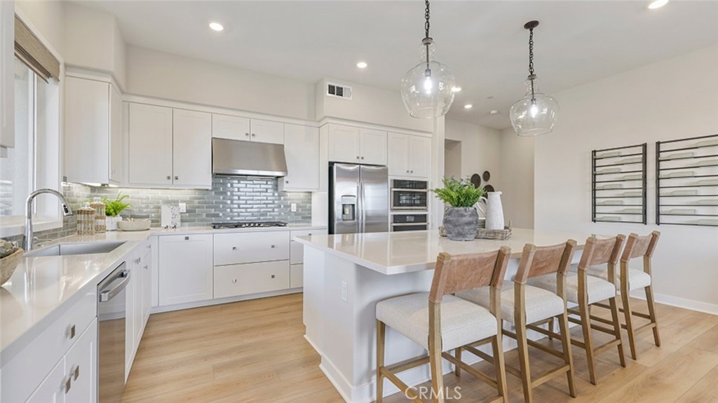 Photos shown are of model only- not actual homesite. - 401 Mulligan, Irvine CA 92618 - photo 1