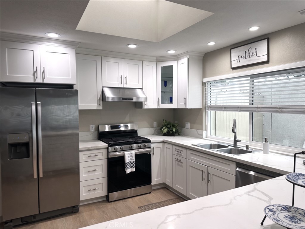 Remodeled kitchen 5 year ago. During the day, Skylight let much light in. - 4212 Fireside, Irvine CA 92604 - photo 5
