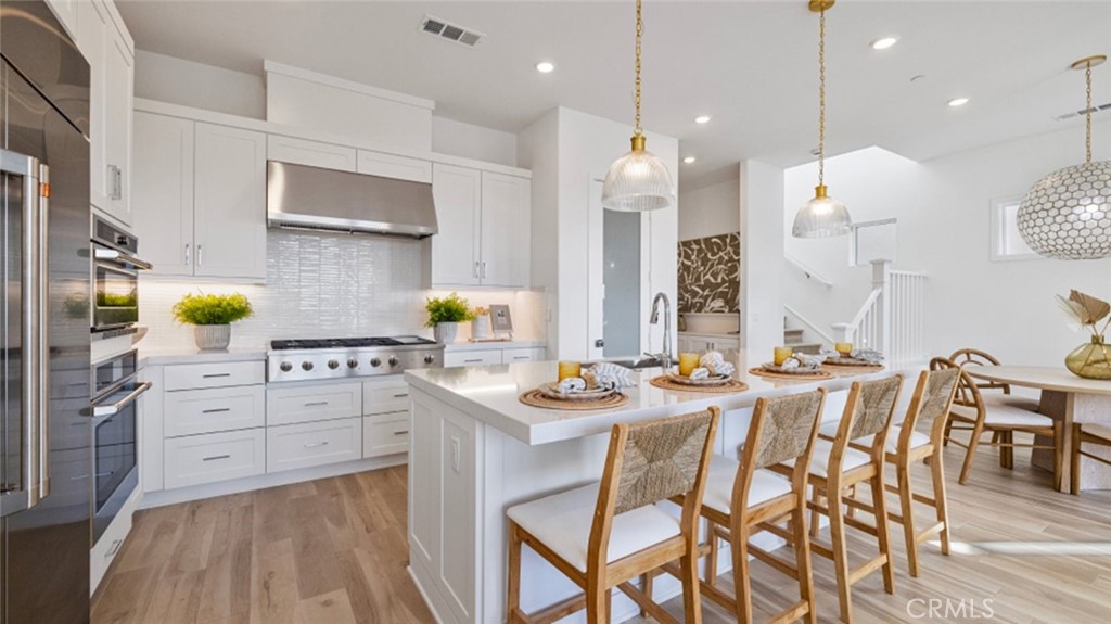 Photos shown are of model only- not actual homesite. - 429 Junco, Irvine CA 92618 - photo 1