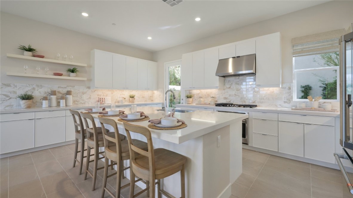 Photos shown are of model only- not actual homesite. - 446 Loon, Irvine CA 92618 - photo 1