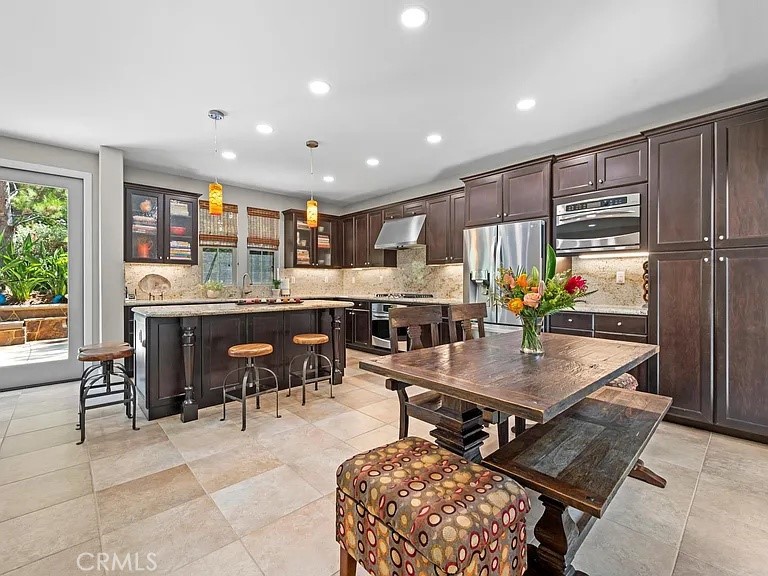 Open concept upgraded kitchen - 46 Pawprint, Irvine CA 92618 - photo 3
