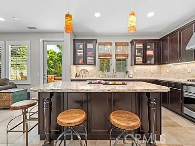 Open concept upgraded kitchen - 46 Pawprint, Irvine CA 92618 - photo 4