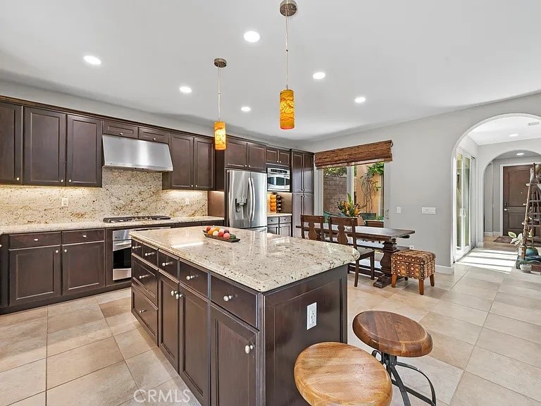 Open concept upgraded kitchen - 46 Pawprint, Irvine CA 92618 - photo 6
