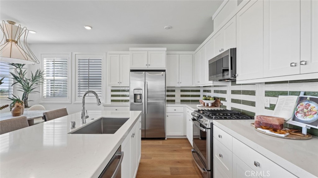 Photos shown are of model only- not actual homesite. - 462 Lobata, Irvine CA 92618 - photo 1
