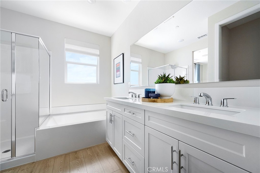 Model Photos: Photos shown are of the model home for this floor plan. Actual finishes, features, and landscaping may var - 467 Treble, Irvine CA 92618 - photo 7