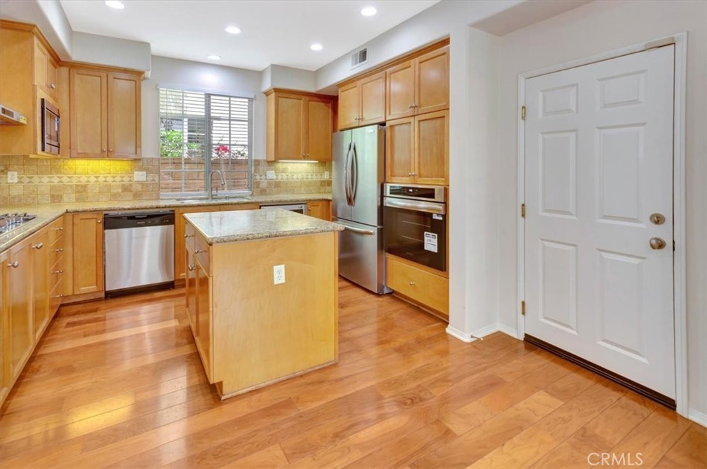 Lots of storage in this lovely kitchen - new microwave, new oven, new dishwasher, new refrigerator, new range hood - has - 47 Canopy, Irvine CA 92603 - photo 13