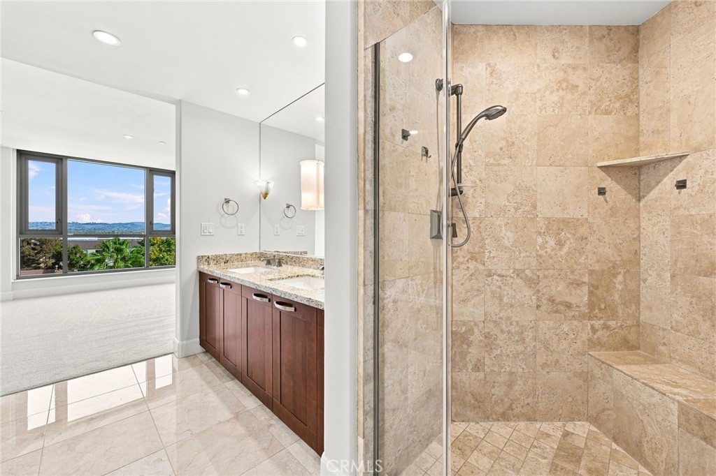 Primary suite bathroom shower - 5066 Scholarship, Irvine CA 92612 - photo 10
