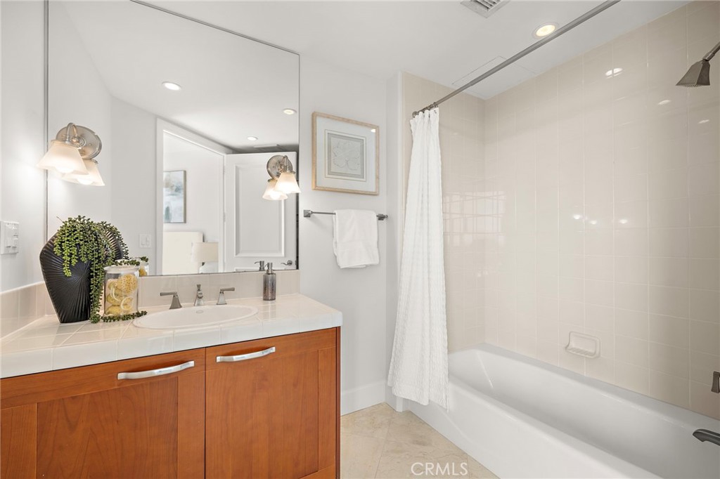 Secondary bedroom suite bathroom - 5066 Scholarship, Irvine CA 92612 - photo 13