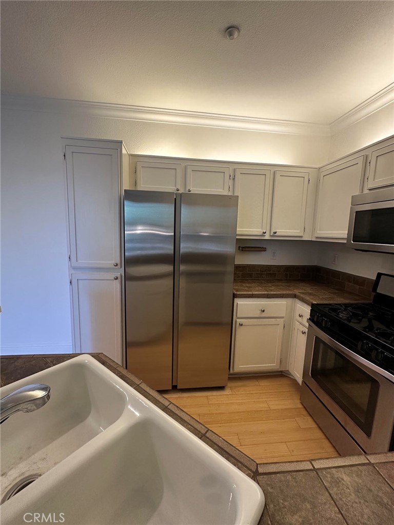 New stainless steel fridge - 511 Birch Grove, Irvine CA 92618 - photo 12