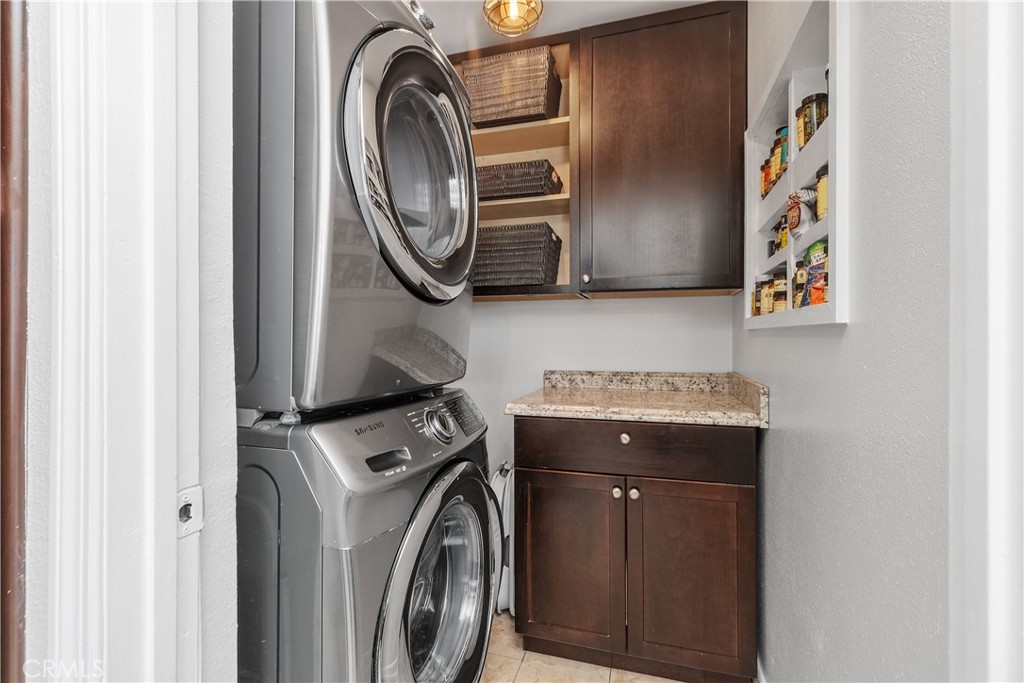 Interior laundry with added storage. - 52 Briarwood, Irvine CA 92604 - photo 8