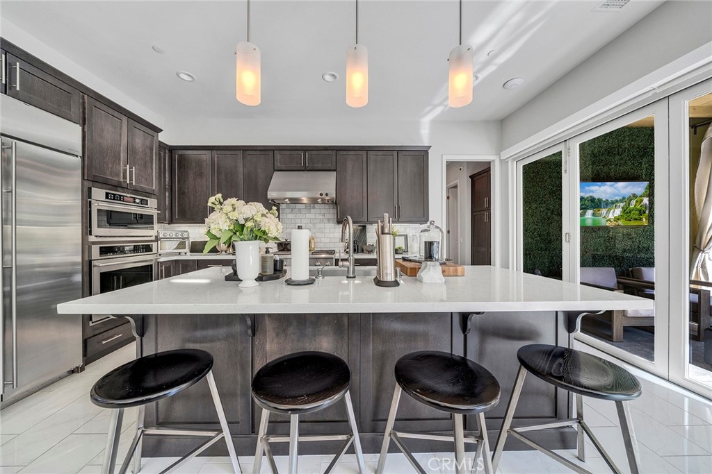 Kitchen Island Seating Area - 52 Woodhill, Irvine CA 92620 - photo 16