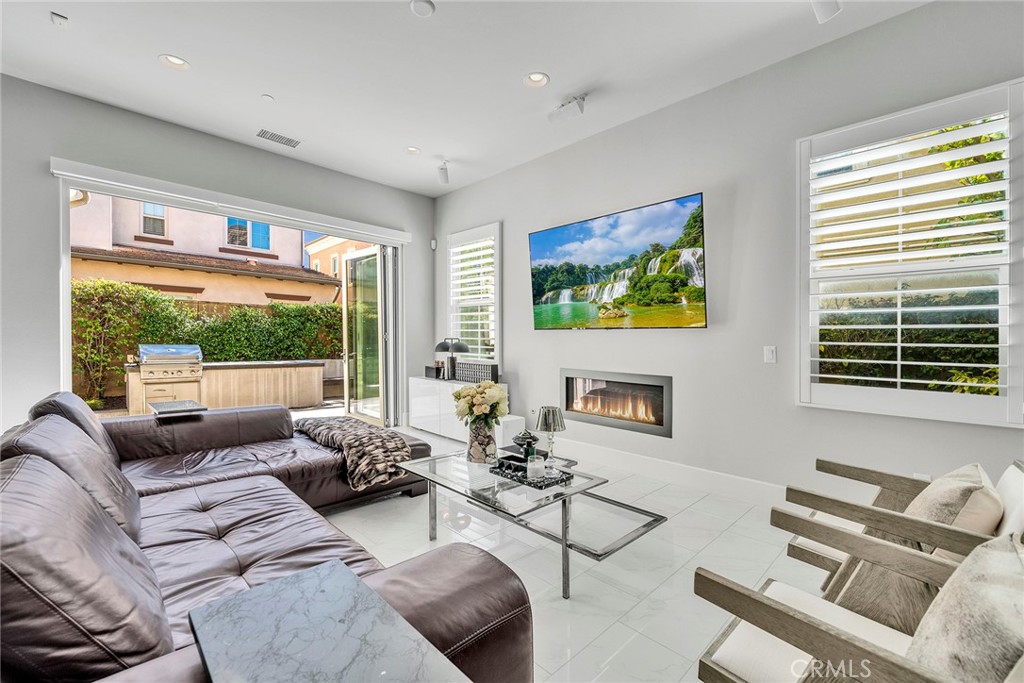 Living Room Opens up to Outdoor Patio - 52 Woodhill, Irvine CA 92620 - photo 22