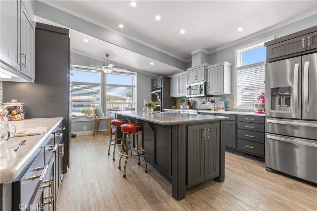 Kitchen w/Island and breakfast bar - 5200 Irvine 58, Irvine CA 92620 - photo 6