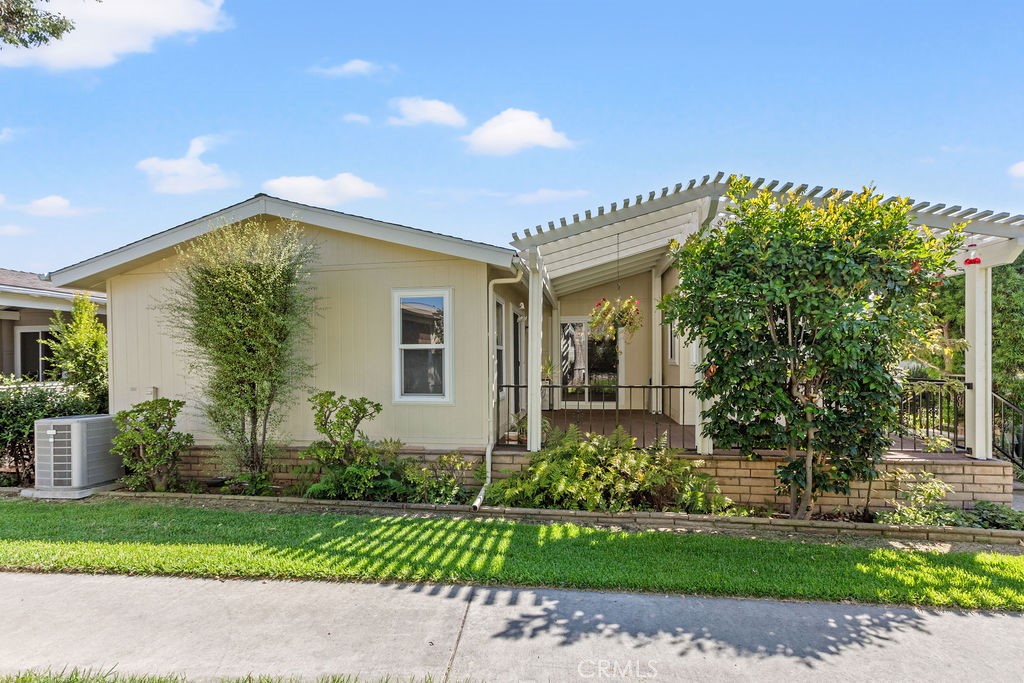 Exterior back of home - 5200 Irvine Blvd. 369, Irvine CA 92620 - photo 3