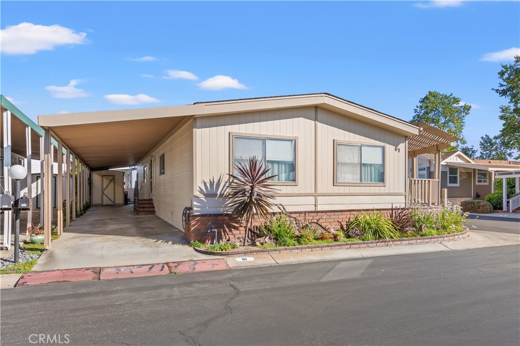 Extra long carport - 5200 Irvine Blvd 61, Irvine CA 92620 - photo 2